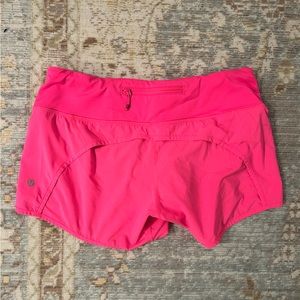 Bright pink Lululemon shorts